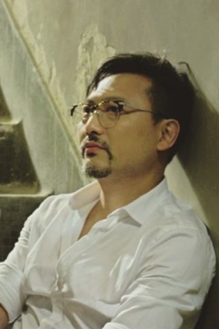 潘燦良在電影《此情此刻》中飾演李志堅